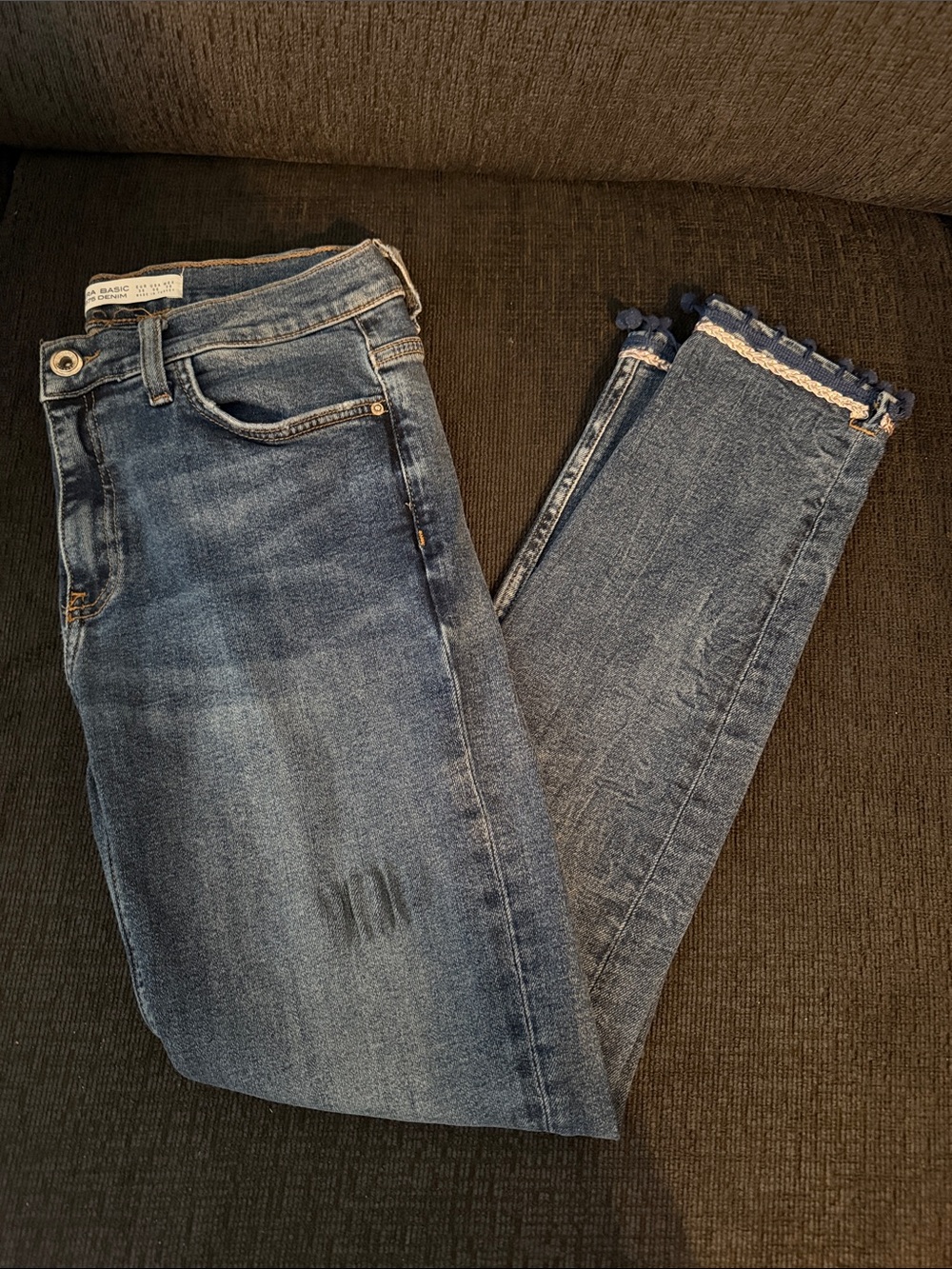 Women’s Blue Denim Jeans with Tassel Hem